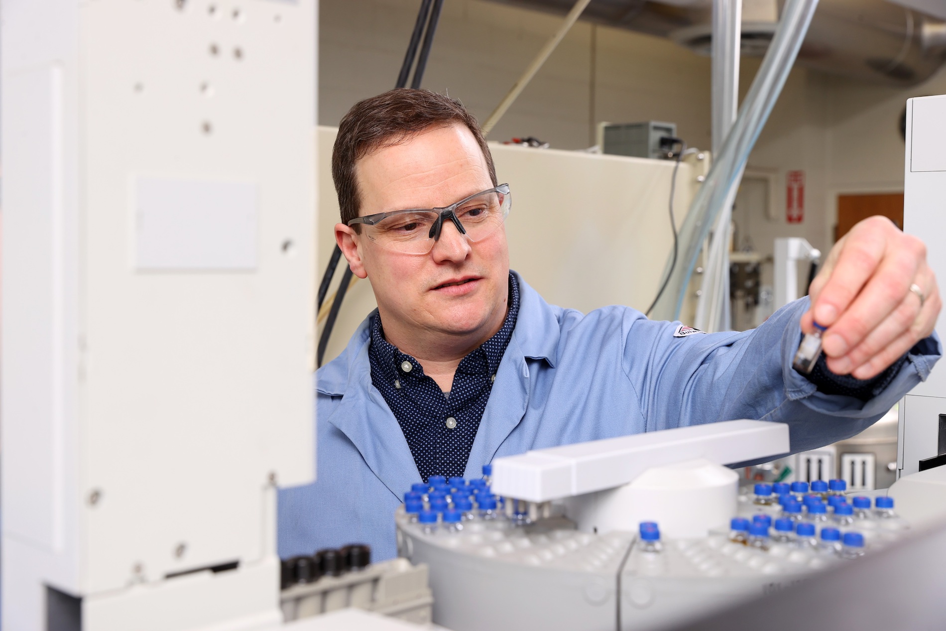 person in lab working on research