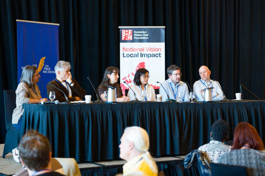 Photo of panel at local news symposium